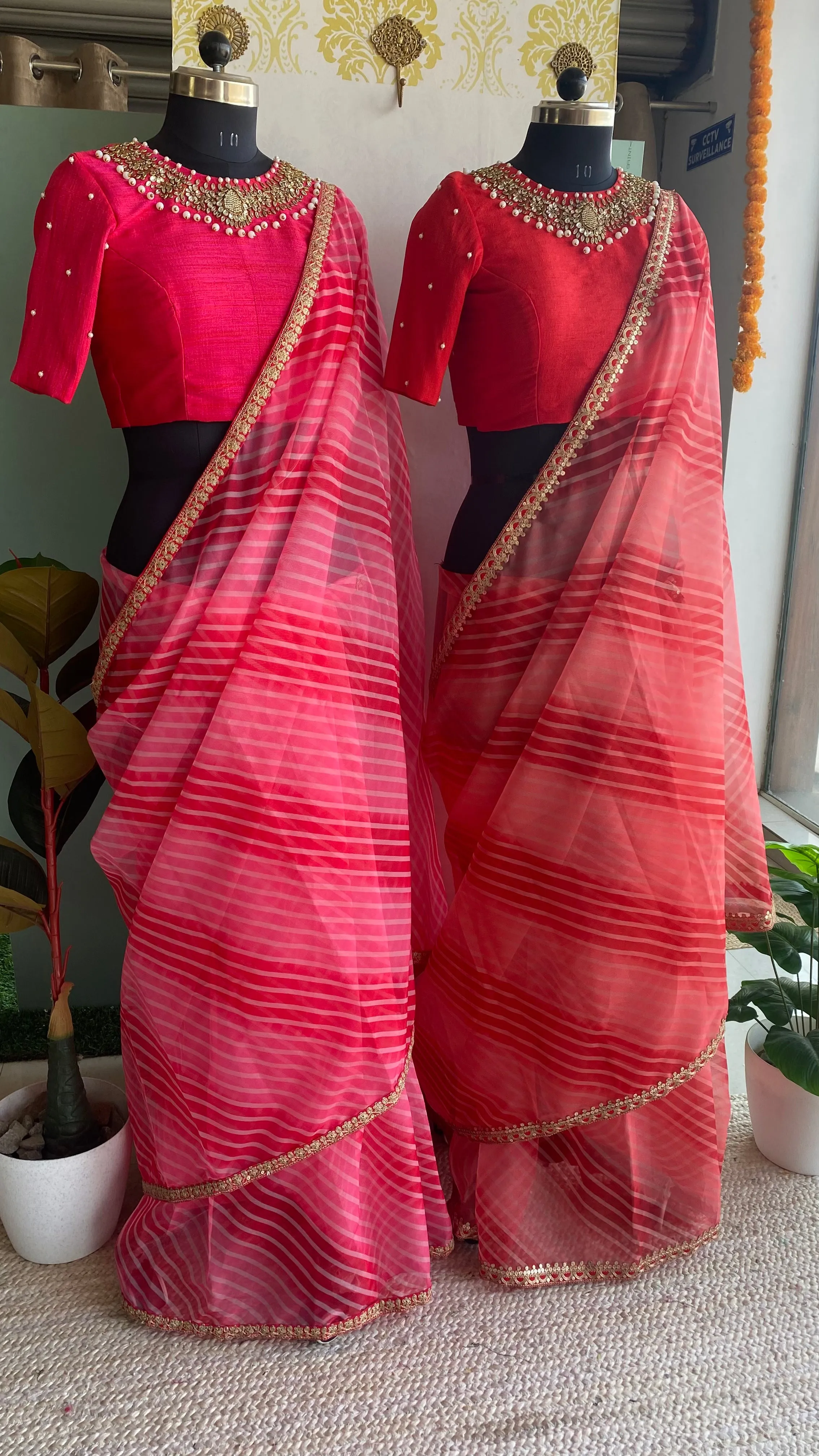 Pink organza saree with jewel neck pink blouse