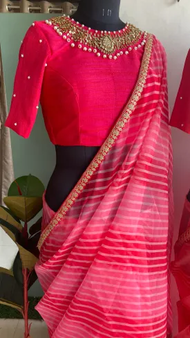 Pink organza saree with jewel neck pink blouse