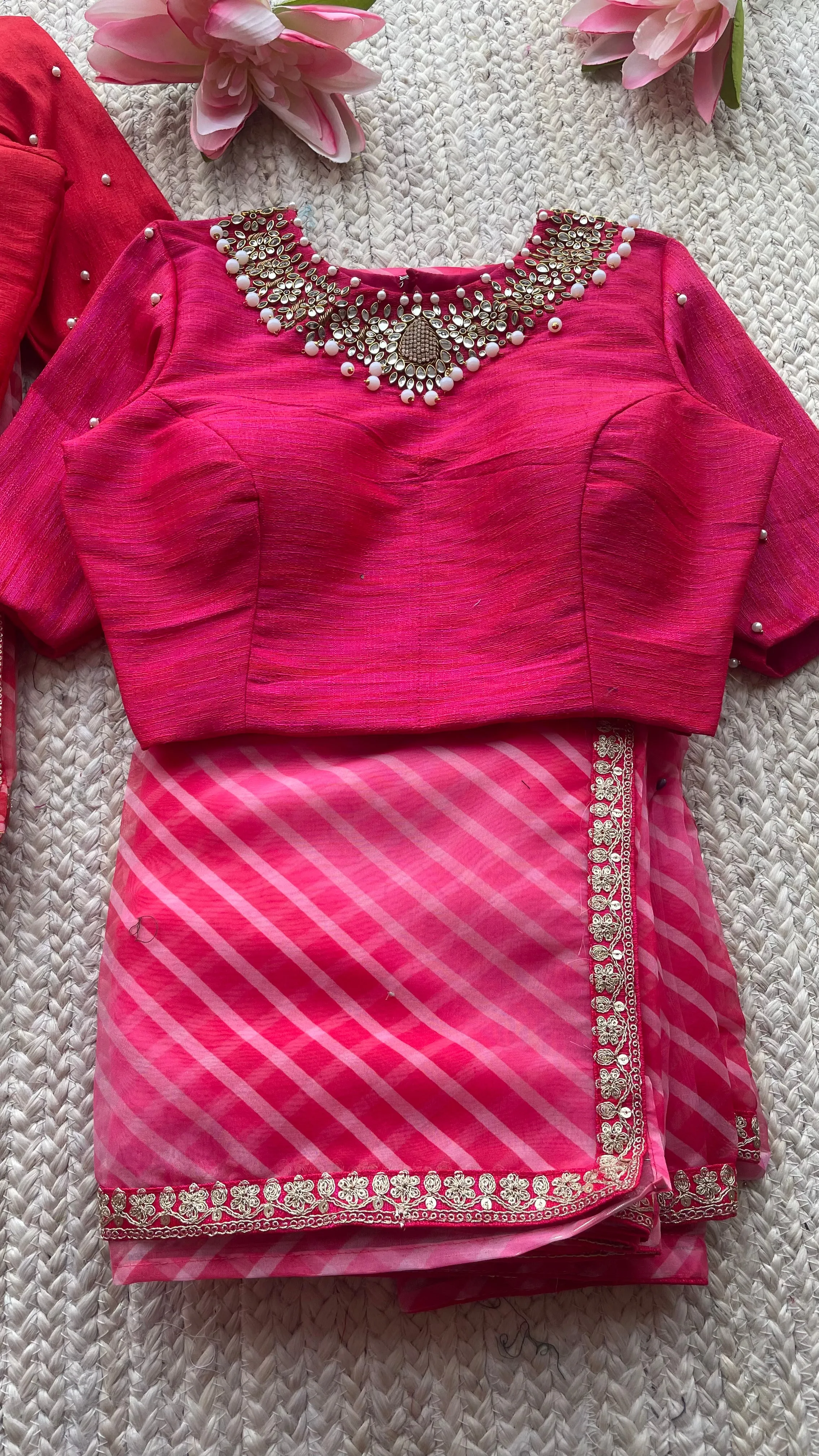 Pink organza saree with jewel neck pink blouse