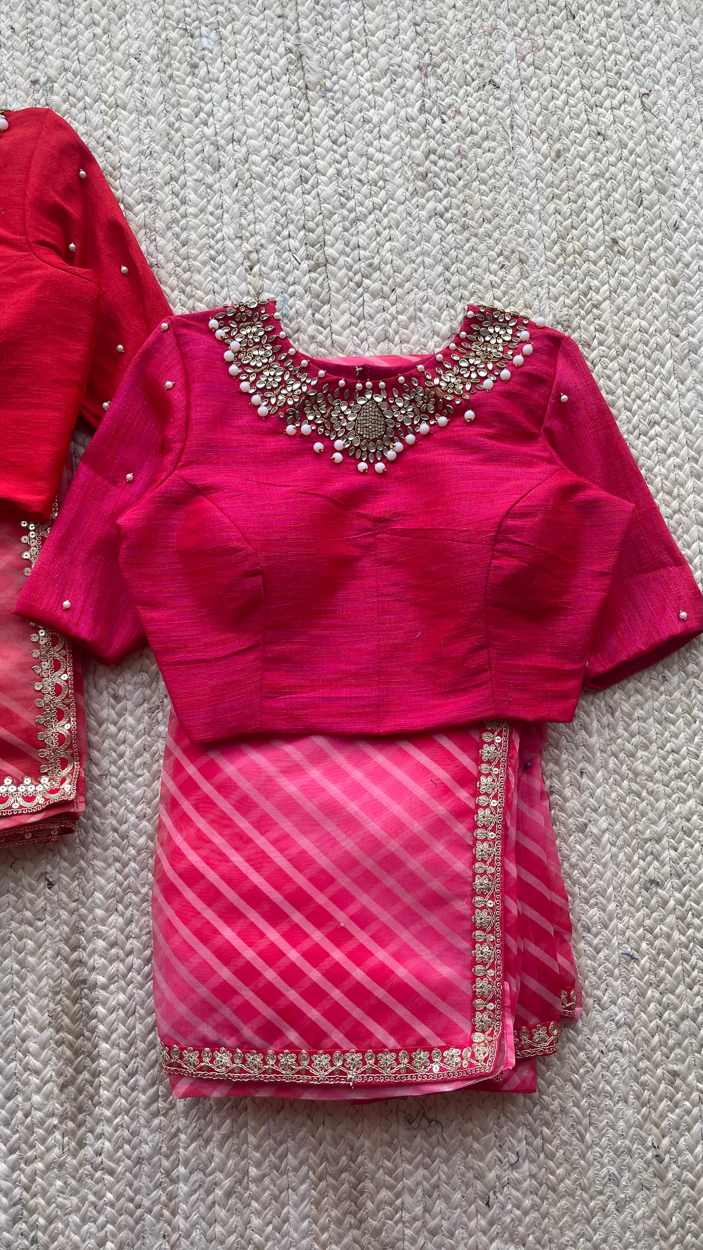 Pink organza saree with jewel neck pink blouse